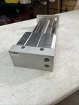 Smc Magnetically Coupled Rodless Cylinder NCY2S40H-G1375-900. Fixed Price $375.00.