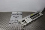 Smc MY2H25G-250L6-M9BL Rodless Cylinder Used With Warranty See All Pictures. Fixed Price $499.99.