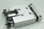 Phd SEC24X3/4-E-GI-J1-H4 Pneumatic Dual Rod Slide Table. Fixed Price $67.98.