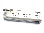 Smc MXS16L-100B Pneumatic Slide Table Symetric 16MM Bore 100MM Stroke. Fixed Price $247.49.