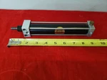 Schrader Gold Medallian Miniture Cylinder 1-1/16 X 6" 1/4 Ports. Fixed Price $96.00.