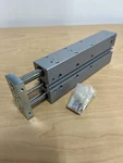 Festo DFM-16-125-B-PPV-A Double-rod Pneumatic Cylinder Slide 8162435. Fixed Price $449.99.