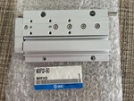 New Smc MXF12-50 Pneumatic Slide Cylinder. Fixed Price $300.00.