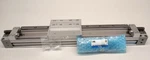 Smc MY1H32G-320LZ-M9BL-XB10 Guided Rodless Cylinder With D-M9BL Switches. Fixed Price $1050.00.