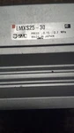 Smc EMXS25-30 Cylinder Slide Table. Fixed Price $225.00.