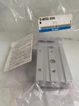 Smc / Guided Cylinder 13-MXS12-20AS. Fixed Price $300.00.