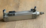 Festo DZH-32-100-PPV-A Pneumatic Cylinder With SMEO-1-S-LED-24B Proximity Sensor. Fixed Price $125.00.