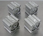 T198433 Lot (4) Smc CDQ2B63-20DZ Compact Cylinder 63MM Bore, 20MM Stroke. Fixed Price $150.00.