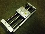 Smc REAL20-200 Slider Rodless Cylinder, Bore 20MM Stroke 200MM. Fixed Price $148.00.