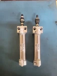 Smc CDM2RA32-100 Pneumatic Cylinder With JA30-10-125 Floating Joint. Fixed Price $200.00.