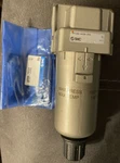 Smc AFD30-N03B-2RZ New Pneumatic Filter With Bracket AF30N03B2RZ. Fixed Price $24.99.