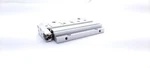 Smc MXF12-50 Low Profile Slide Table, 50MM Stroke, 12MM Bore, 22 102 Psi. Fixed Price $250.00.