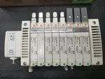 Smc Valve Manifold 3X VQC2A01NY-5, 4X VQC2200N-51, 1X VQC2400N-51 W/ EX150-SDN1. Fixed Price $299.99.